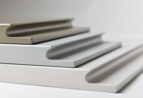 J-pull handleless kitchen showing the profile detail on base units and drawer fronts in a contemporary German kitchen layout