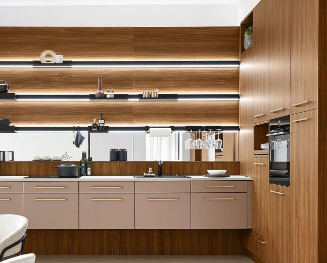 Handled kitchen showing bar handles on door fronts in a contemporary German kitchen layout