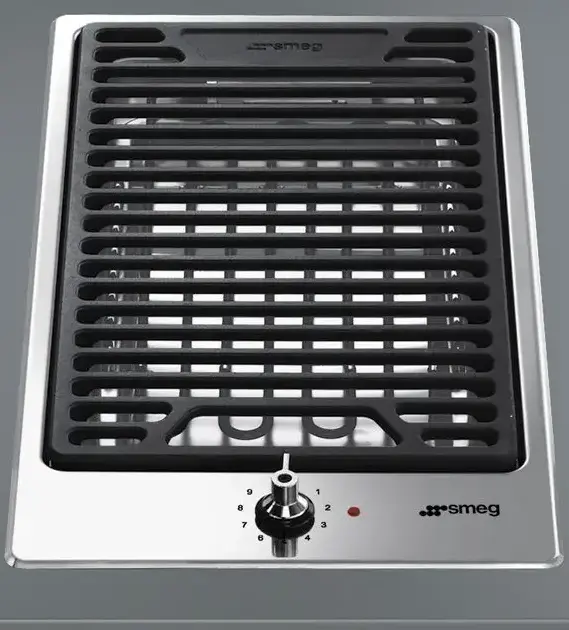 Grill hob showing cast iron ridged grill plate set into a domino-format worktop module