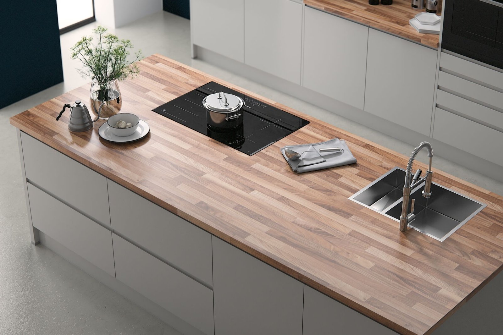 Laminate worktop in a contemporary kitchen setting showing the smooth surface finish and clean edge profile with a realistic stone or wood effect pattern typical of German kitchen manufacturer laminate ranges