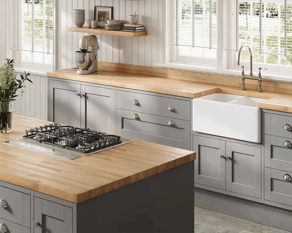 Solid wood worktop near a sink showing the importance of proper oiling and moisture management around the wet zone with the natural grain visible on an oiled hardwood surface