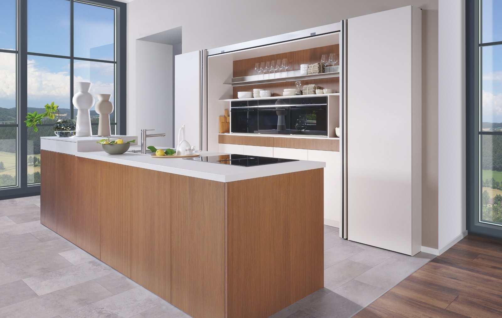 Brigitte push-to-open kitchen showing flat fronts in a family kitchen layout with integrated appliances
