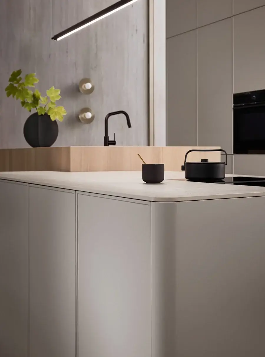 Bauformat Skinny Shaker kitchen showing the narrow frame profile in a deep tone colour on base units with a pale wall unit run above