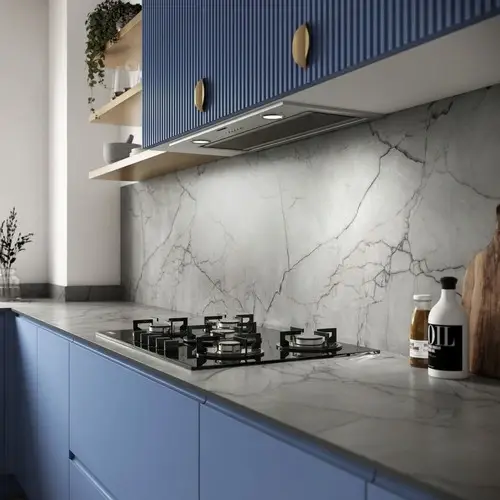 HPL worktop showing a stone-effect or concrete-effect high-pressure laminate surface with textured matte finish and consistent pattern across the full worktop run in a contemporary fitted kitchen