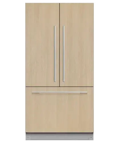 Integrated French door fridge freezer showing the wide format built-in refrigerator with French door opening giving full-width access to the chilled section behind furniture doors in a contemporary kitchen design
