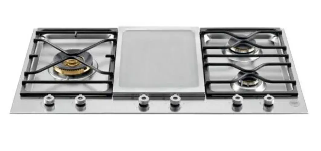 Dual fuel hob showing gas burners alongside a griddle plate section on a combined cooking surface
